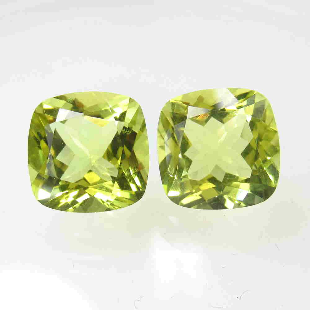 13.27 Ctw Natural Lemon Quartz Cushion Pair: Title: 13.27 Ctw Natural Lemon Quartz Cushion Pair Stone Clarity: VVS Gemstones: Lemon Quartz Carat Weights: 13.27 Size/Dimensions: 12.10 x 12.10 x 7.80 mm / 2 PC's Additional Information: Top Quality