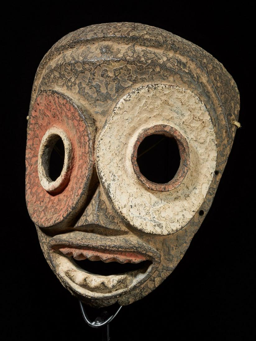 Bicolor Dancing Face Mask, Ibibio people, Nigeria: Title: Bicolor Dancing Face Mask, Ibibio people, Nigeria Maker: coll.Klaus Paysan Origin: Nigeria Dimension: 27 x 22 x 10 Material: Wood Additional Informatioon: A wooden face mask coloured in a strik