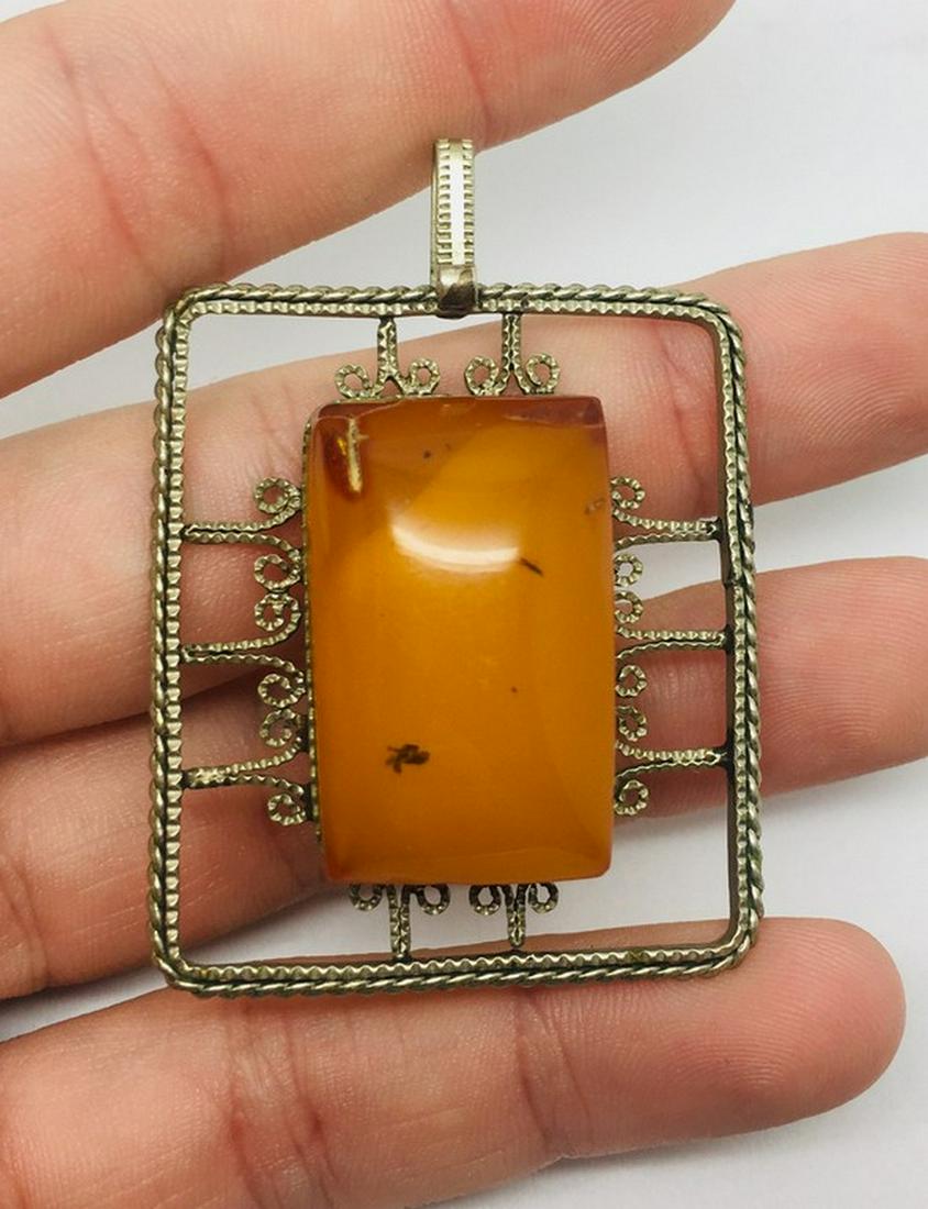 Grand Unique Vintage Amber Pendant shaped like an (1 of 6)