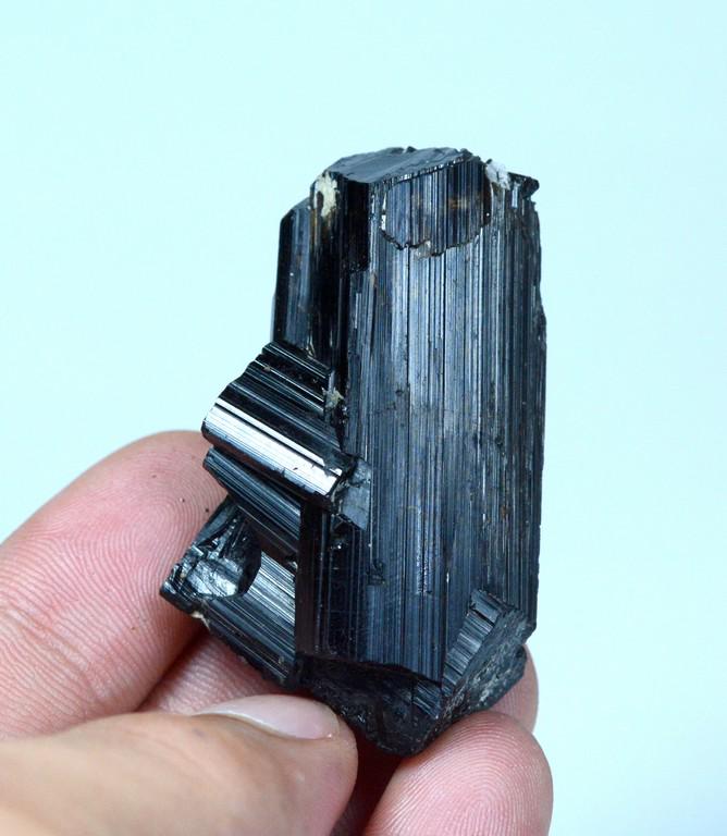 37 Gram Top Quality Black Tourmaline Specimen: Title: 37 Gram Top Quality Black Tourmaline Specimen Weight: 37 Gram Size/Dimensions: 49x29x20 mm Origin: Pakistan Reserve: $15.00 Shipping: Domestic: Flat-rate of $15.00 to anywhere within the contig