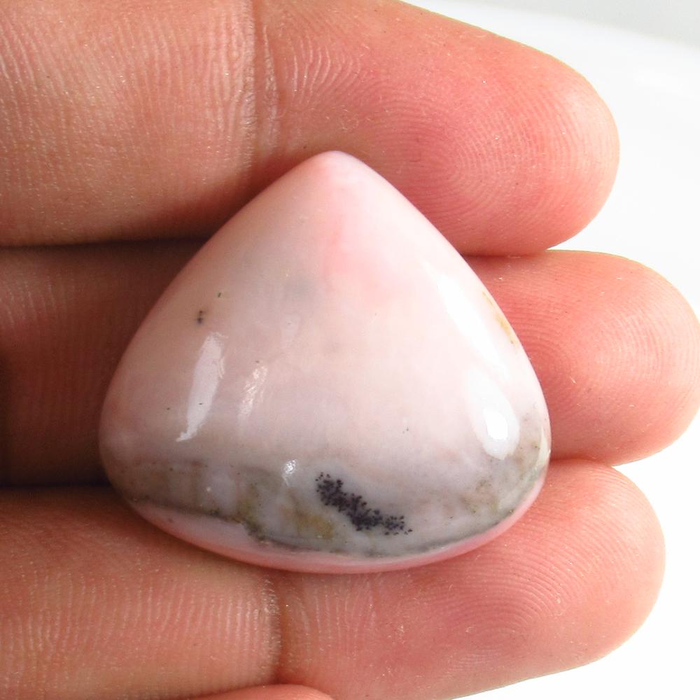 38.51 Ct Natural African Welo Pink Opal Pear Cabochon: No Reserve! Title: 38.51 Ct Natural African Welo Pink Opal Pear Cabochon Stone Clarity: Opaque Gemstone: Natural Pink Opal Carat Weight: 38.51 Size/Dimensions: 27.00 x 29.00 x 9.50 mm Additional Infor