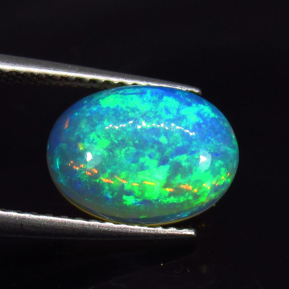 2.18 Ct Natural Ethiopian Multicolor Opal Oval Cab (1 of 2)
