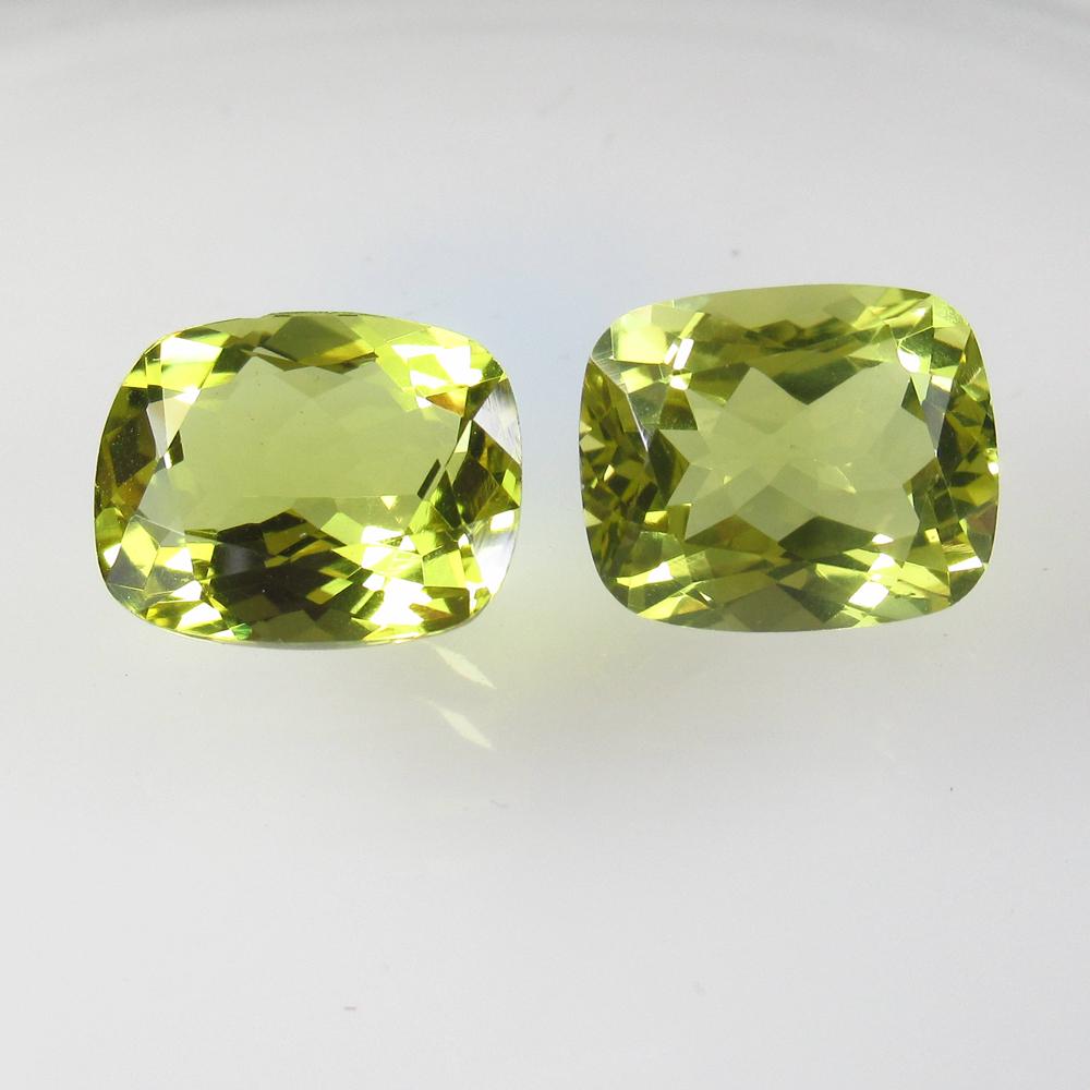 10.60 Ct Natural Lemon Quartz Cushion Pair: No Reserve! Title: 10.60 Ct Natural Lemon Quartz Cushion Pair Stone Clarity: VVS Gemstone: Natural Lemon Quartz Carat Weight: 10.60 Size/Dimensions: 12.40 x 10.10 x 6.30 mm / 2 PC's Additional Informa