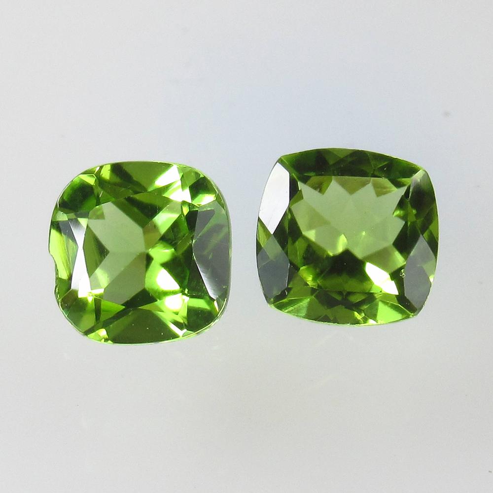 2.88 Ct Natural Pakistan Peridot Cushion Pair: No Reserve! Title: 2.88 Ct Natural Pakistan Peridot Cushion Pair Stone Clarity: VVS Gemstone: Natural Peridot Carat Weight: 2.88 Size/Dimensions: 7.10 x 7.00 x 4.30 mm / 2 PC's Additional Information: