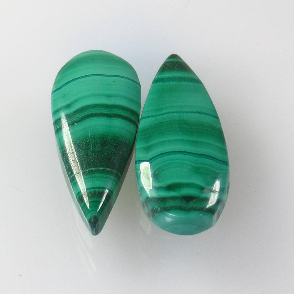 22.83 Ct Natural Green Malachite Matching Pear Pair: No Reserve! Title: 22.83 Ct Natural Green Malachite Matching Pear Pair Stone Clarity: Opaque Gemstone: Natural Malachite Carat Weight: 22.83 Size/Dimensions: 22.00 x 10.90 x 4.90 mm / 2 PC's Additiona