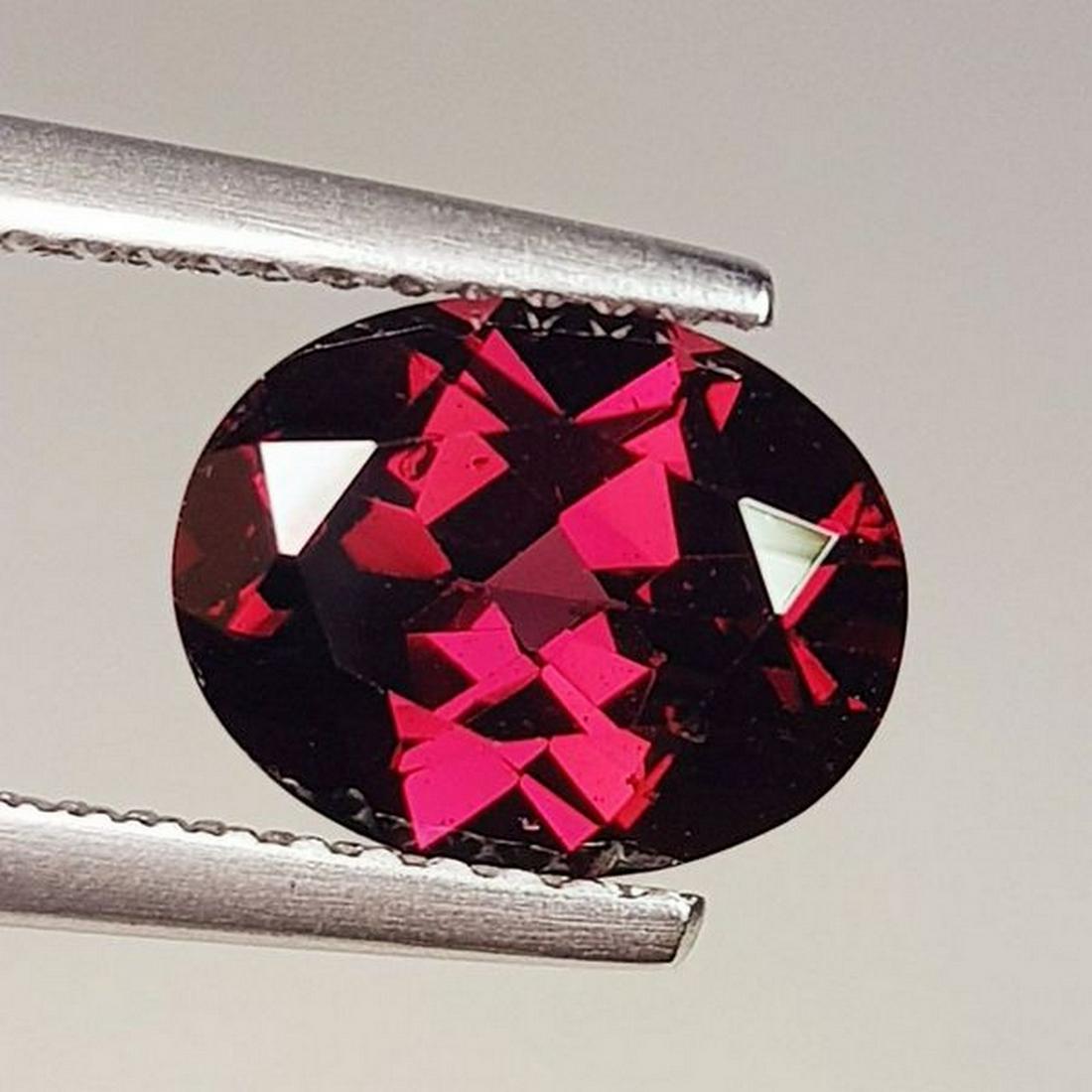Natural Rhodolite Garnet Oval Cut 2.40 ct: No Reserve! Title: Natural Rhodolite Garnet Oval Cut 2.40 ct Color/Clarity: VVS - VS Carat Weight: 2.4 Size/Dimensions: 9.00 x 7.00 x 4.50 Additional Information: Oval - Burma Shipping: Domestic: Fla