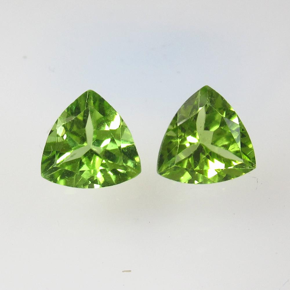 2.27 Ctw Natural Pakistan Peridot Trillion Pair: No Reserve! Title: 2.27 Ctw Natural Pakistan Peridot Trillion Pair Stone Clarity: VVS Gemstones: Peridot Carat Weights: 2.27 Size/Dimensions: 7.10 x 7.10 x 3.80 mm / 2 PC's Additional Information: Top
