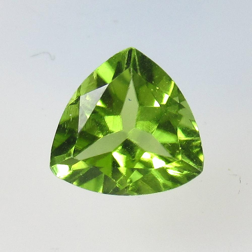 1.20 Ctw Natural Pakistan Peridot Trillion Cut: No Reserve! Title: 1.20 Ctw Natural Pakistan Peridot Trillion Cut Stone Clarity: VVS Gemstones: Peridot Carat Weights: 1.2 Size/Dimensions: 7.00 x 6.90 x 4.00 mm Additional Information: Top Class Lust