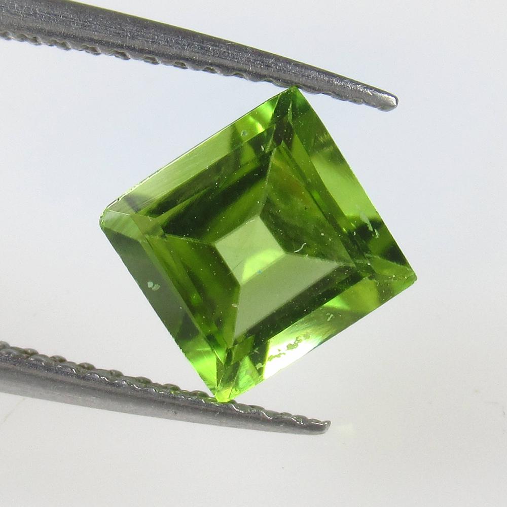 1.66 Ctw Natural Pakistan Peridot Square Cut: No Reserve! Title: 1.66 Ctw Natural Pakistan Peridot Square Cut Stone Clarity: VVS Gemstones: Peridot Carat Weights: 1.66 Size/Dimensions: 6.90 x 6.80 x 4.10 mm Additional Information: Top Class Luste