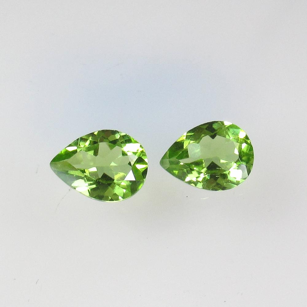 2.00 Ctw Natural Pakistan Peridot Pear Pair: No Reserve! Title: 2.00 Ctw Natural Pakistan Peridot Pear Pair Stone Clarity: VVS Gemstones: Peridot Carat Weights: 2 Size/Dimensions: 8.00 x 6.00 x 3.50 mm / 2 PC's Additional Information: Top Class 