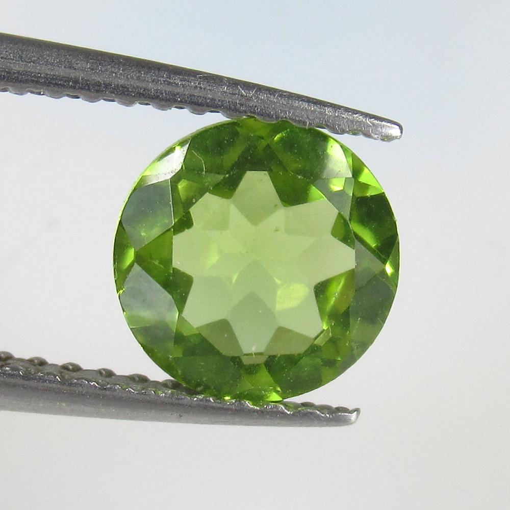 1.21 Ctw Natural Pakistan Peridot Round Cut: No Reserve! Title: 1.21 Ctw Natural Pakistan Peridot Round Cut Stone Clarity: VVS Gemstones: Peridot Carat Weights: 1.21 Size/Dimensions: 7.10 x 7.10 x 3.80 mm Additional Information: Top Class Luster