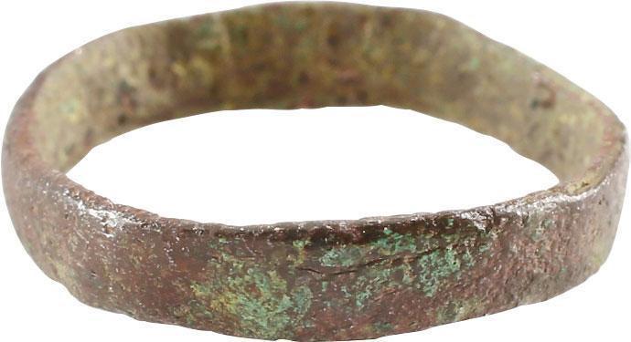 RARE VIKING RING, 900-1050 AD JEWELRY SZ 7 ¾: Size 7 3/4. Bronze, broad width band, 4.0mm, with low rounded face and cast with a central core which was laboriously removed to finish the ring for wear. Mottled red/brown patina with encrustation fr