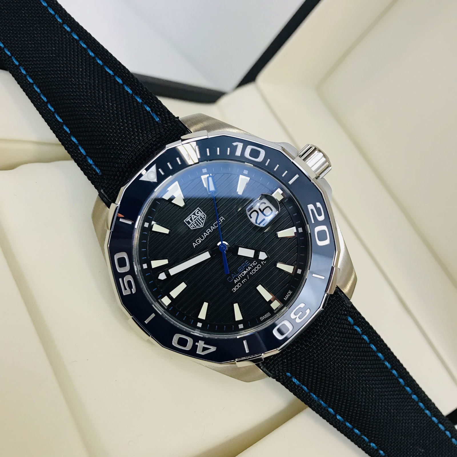 TAG Heuer Aquaracer 300 Calibre 5 Automatic Watch: Title: TAG Heuer Aquaracer 300 Calibre 5 Automatic Watch Brand: TAG Heuer Size: Case size: 43 mm Bracelet Length: Standard 184mm-197mm Movement Type: Calibre 5 Automatic (Swiss Made) Box/Papers:Brand