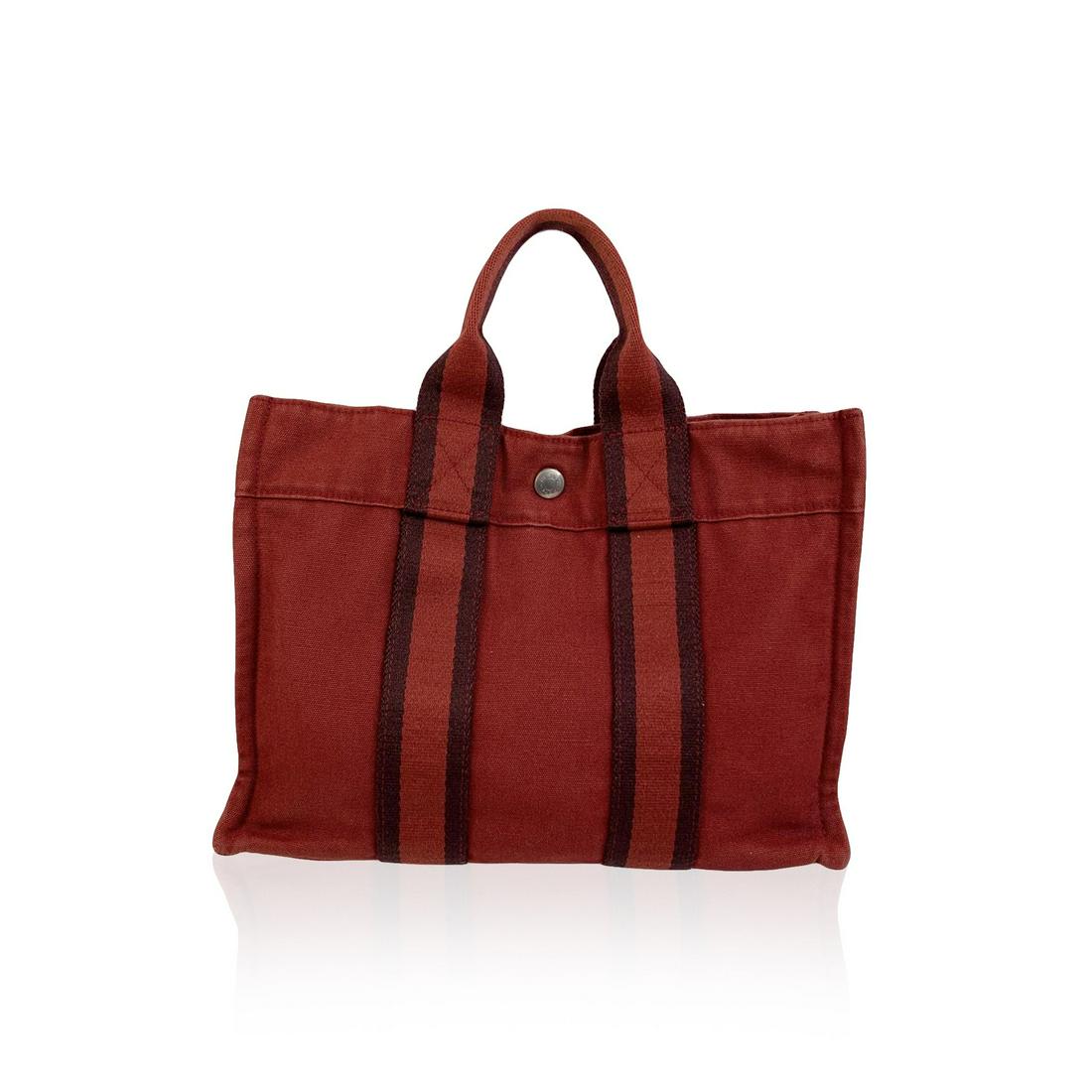 Hermes Paris Vintage Red Cotton Fourre Tout PM Tote Bag: Model: 'HERMES FOURRE TOUT - PM' Tote handbag - Made in France - Color: red - Material: 100% cotton - It has snaps on both ends for expansion - Durable canvas handles perfect for casual and everyday u
