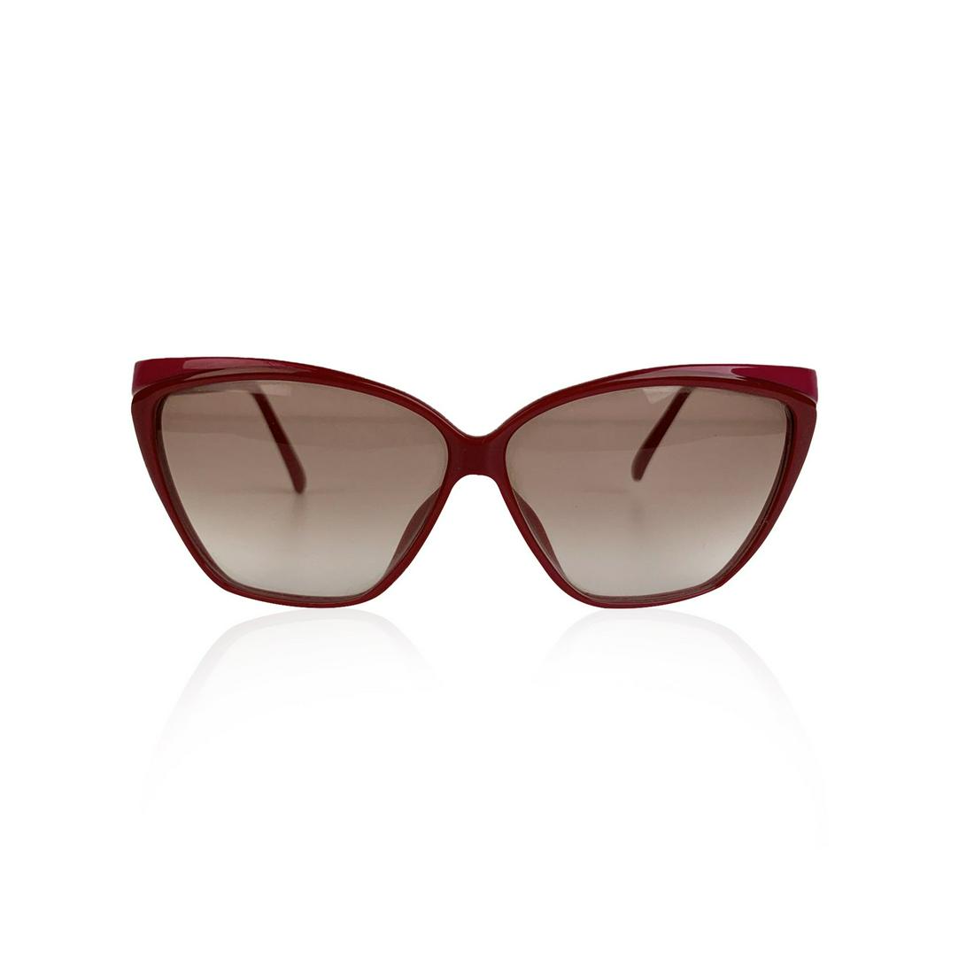 Christian Dior Vintage Burgundy Pink Optyl Sunglasses: CHRISTIAN DIOR Vintage 1980s bicolor burgundy and pink Optyl frame sunglasses. Cat-eye design. New light brown gradient lenses. Handmade in Germany. CD logo on temples. Mod. & Refs: 2324 - 30 Details 