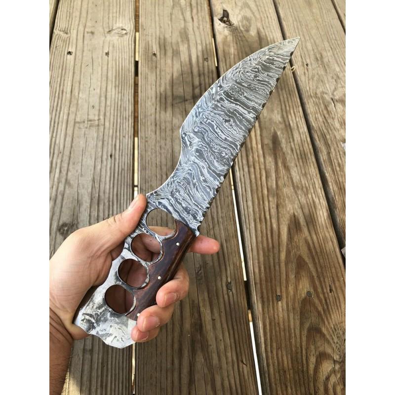 Damascus steel knife,with leather sheath,rose wood: Knife "Knuckle" made of damask steel. Handle – rose wood, scabbard - leather . Damascus knives are very durable, look great and keep sharpness perfectly. Damascus steel has high quality contents to 