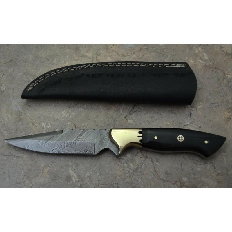 Damascus steel knife, bull horn handle, leather: Knife "Hunter" made of damascus steel. Handle - bull horn and scabbard - leather . Damascus knives are very durable, look great and keep sharpness perfectly. Damascus steel has high quality contents t