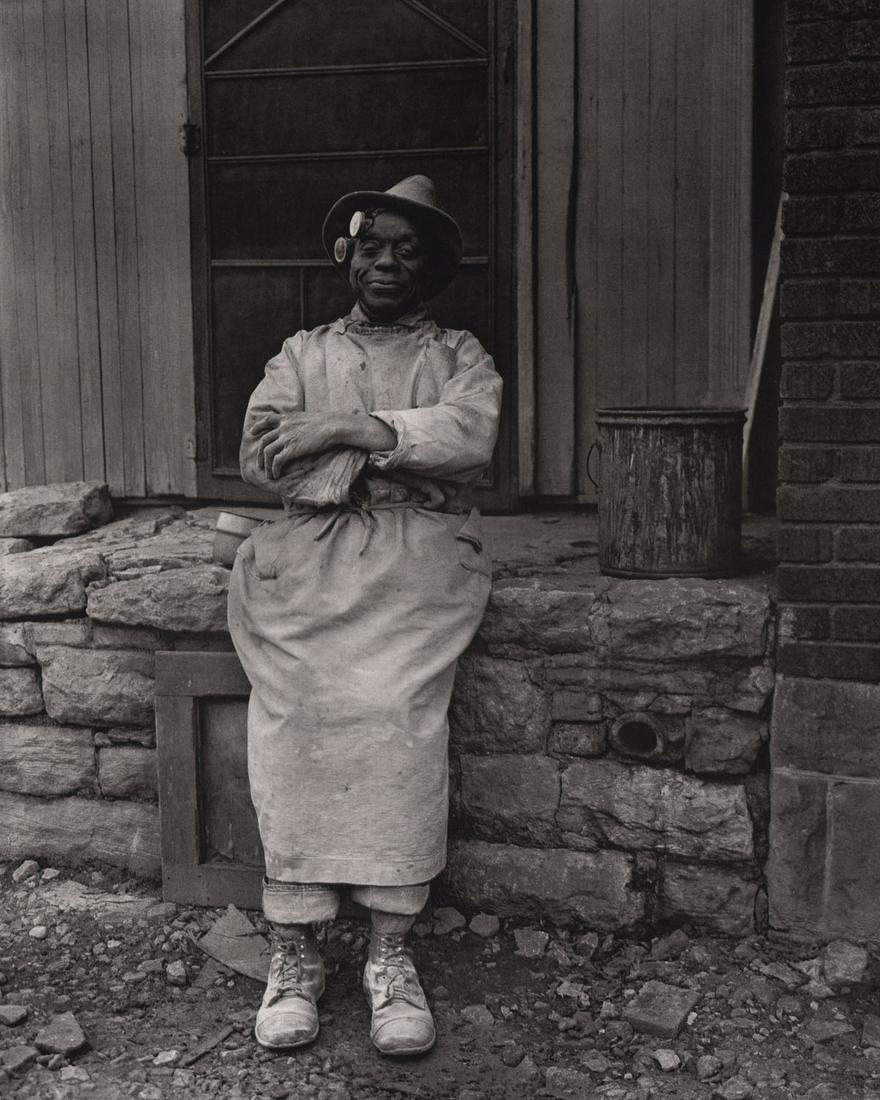 EDWARD WESTON - William Edmondson, Tennessee, 1941: Artist: EDWARD WESTON Print Title: William Edmondson, Tennessee, 1941 Medium: Photoengraving Printed in USA in 1970’s Image Size approx: 9.5 x 7.5” Edward Weston 1886-1958) was a 20th-century Amer