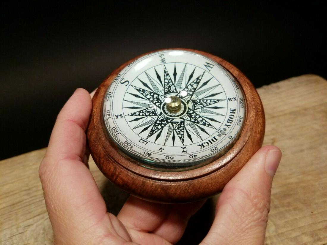 Magnifying Glass Navigational Compass: 4" wide x 1 3/4" tall Nice reproduction of an antique compass. Great heavy quality piece made to look like an original! Reserve: $25.00 Shipping: Domestic: Flat-rate of $8.00 to anywhere within the co