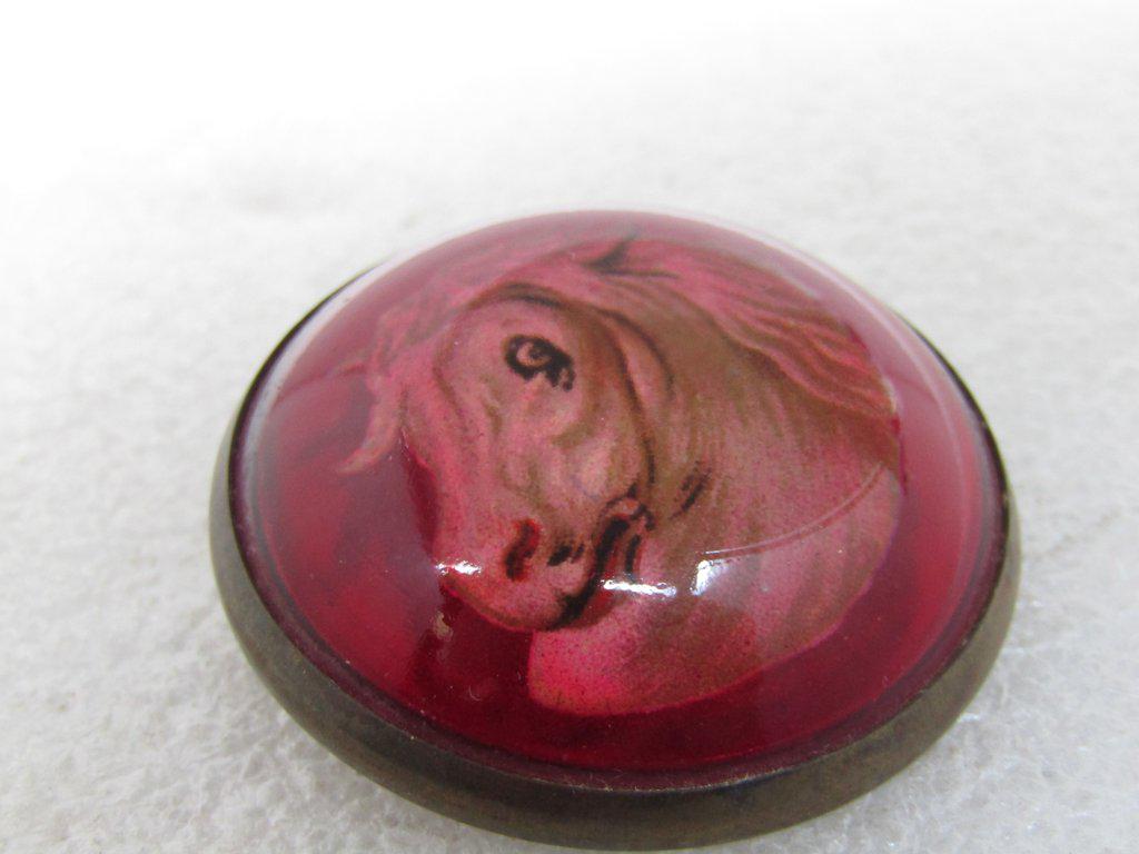 Vintage Red Glass Horse Bridal Rosette Button Brooch,: Vintage Red Glass Horse Bridal Button Rosette Brooch, 1920's-1930's - very nice white horse over candy apple red glass - domed and 1.75" across with a brass back and pinback. Good condition - better t