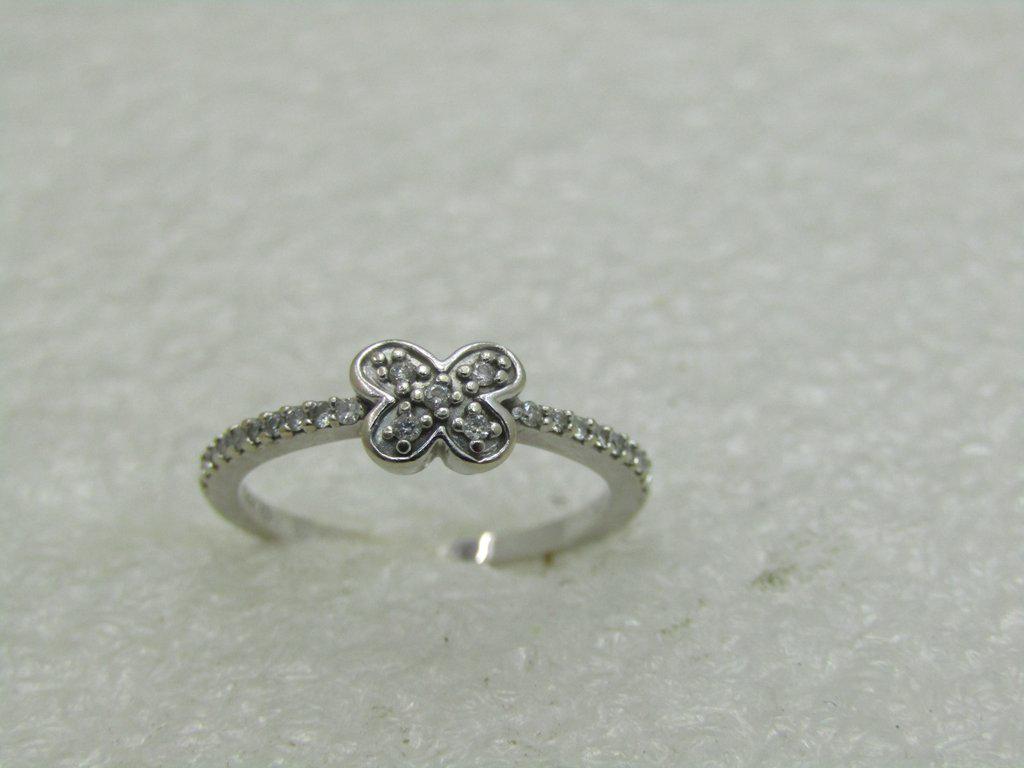 14kt Diamond Butterfly Ring, Sz. 4.5, Signed JD, 1.51: 14kt Diamond Butterfly Ring, Sz. 4.5. Five diamonds diamonds in the butterfly and pave set down the top sides of the band. The ring can be resized by your jeweler. It is signed what looks like triangu