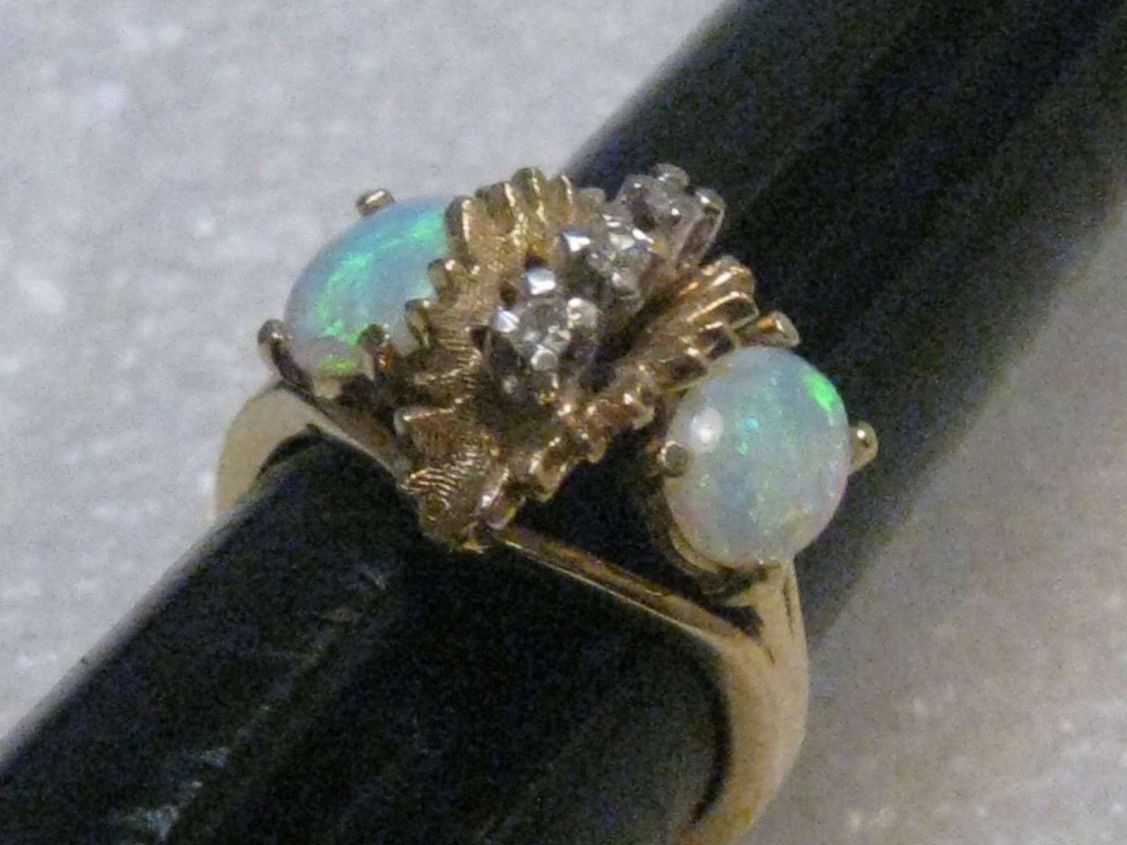 Vintage 14kt Opal & Diamond Ring, Mid-Century, size: Vintage 14kt Opal & Diamond Ring. Size 6.25, 5.44 grams. The opals are 7.5mm by 5.5mm, which are appx. .75ctw each. There are three diamonds down the center that are appx. 2mm each. The diamonds are c