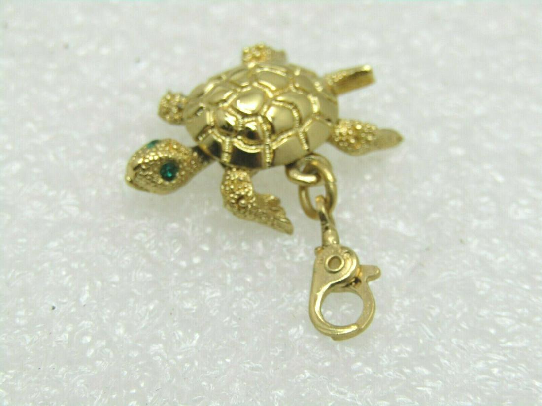 Vintage Monet Articulated Turtle Charm Pendant, Lobster: Vintage Monet Articulated Turtle Charm or Pendant -the head moves. Green rhinestone eyes and textured detail to give the turtle a good look, much like a real turtle has. The charm has a lobster-like c