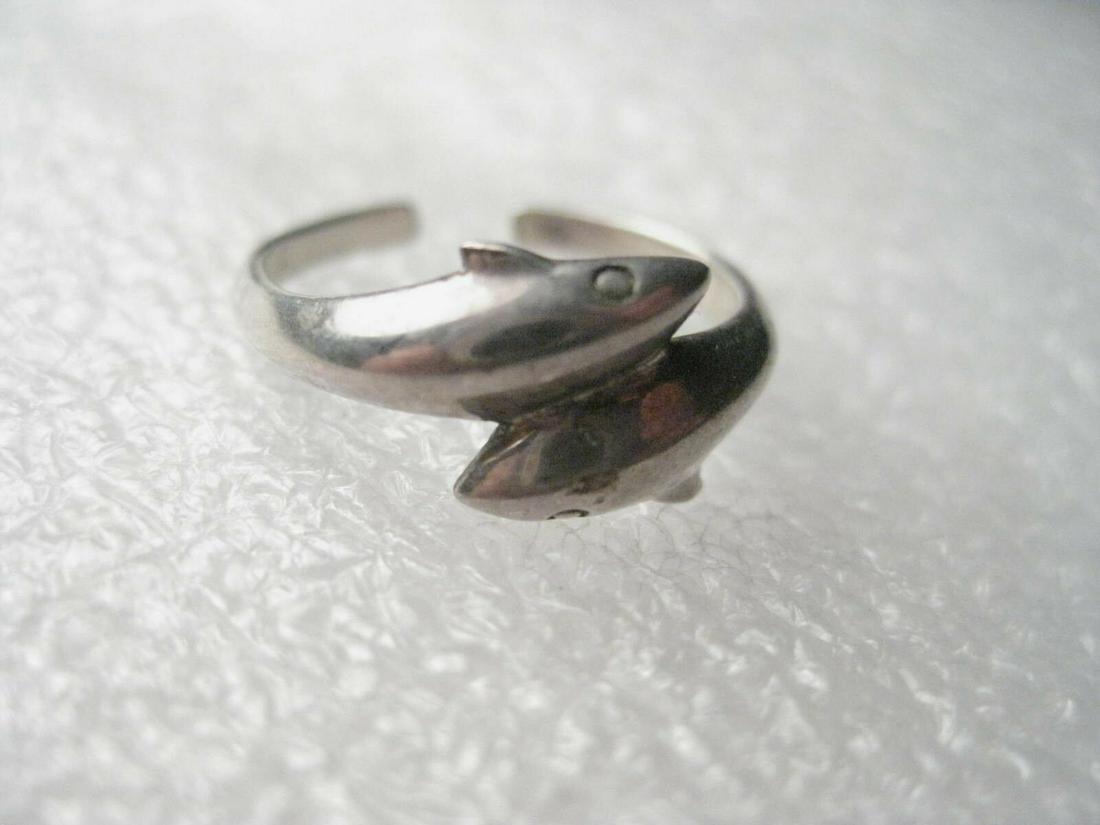 Vintage Sterling Silver Dolphin Toe Ring, sz. 3.5 but: Vintage -sterling silver double dolphin toe ring - two dolphins side-by-side at the front of the toe ring - as though they are arching out of the water - facing opposite directions. It is a size 3.5 b