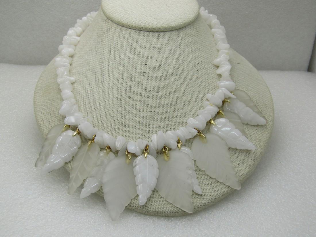 Vintage Swoboda White Jade Leaf Necklace 18": Vintage Swoboda White Jade Leaf Necklace 18", 1960's-1970's, White jade nuggets and carved leaves with other translucent leaves. With original Swoboda Foil Tag. Box clasp with a typical 1960's-1970's 