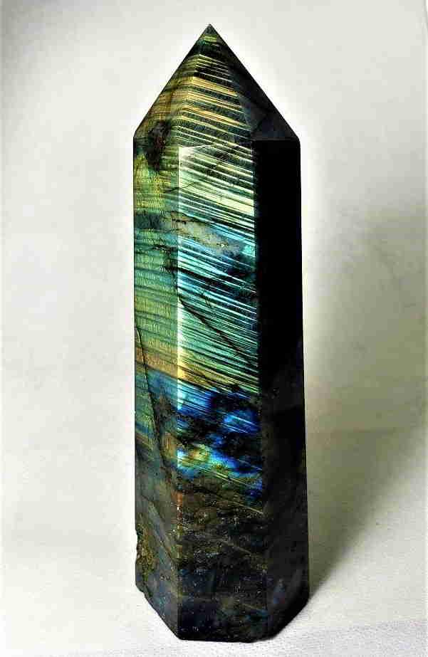 Polished Fire Labradorite Tower - 529 Grams: Title: Polished Fire Labradorite Tower - 529 Grams Gemstones: Mineral Carat Weights: 529 GRAMS Size/Dimensions: 154X55X44 mm Additional Info: Polished Fire Labradorite Tower - 529 Grams Reserve: $120.