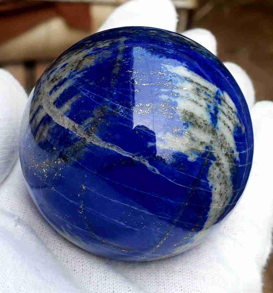Royal Blue Lapis Lazuli Sphere: Title: Royal Blue Lapis Lazuli Sphere Gemstones: Mineral Carat Weights: 270 Grams Size/Dimensions: Diameter - 58 mm Additional Info: Royal Blue Lapis Lazuli Sphere Reserve: $100.00 Shipping: Domestic: