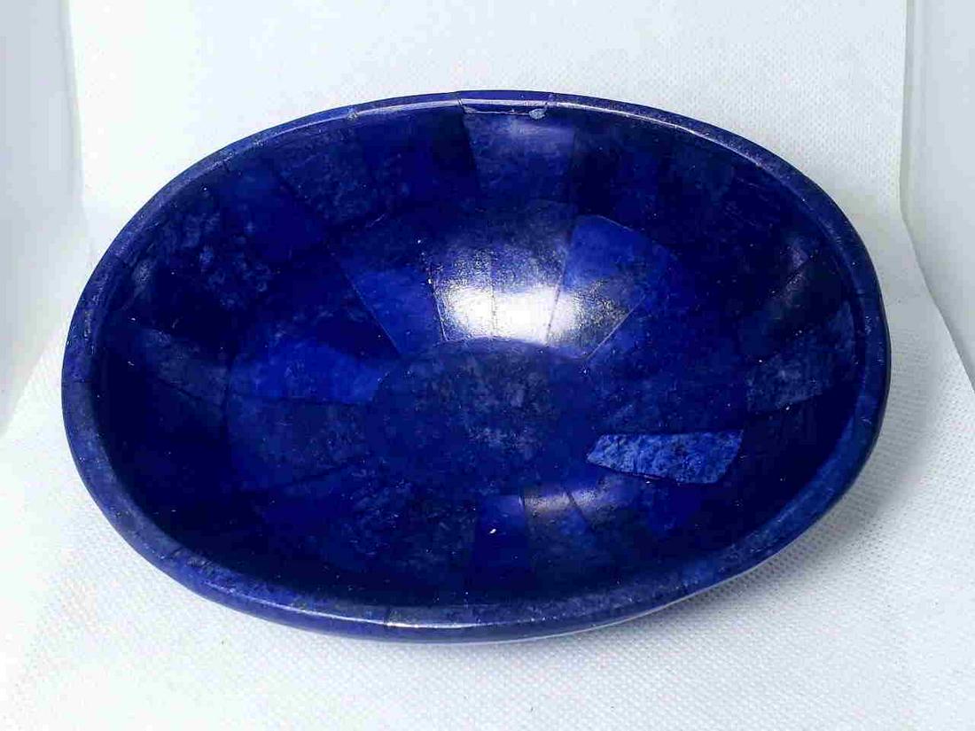 Royal Blue Lapis Lazuli Bowl: Title: Royal Blue Lapis Lazuli Bowl Gemstones: Mineral Carat Weights: 402 Grams Size/Dimensions: 15X11X4.5 CM Additional Info: Royal Blue Lapis Lazuli Bowl Reserve: $90.00 Shipping: Domestic: Flat-rat