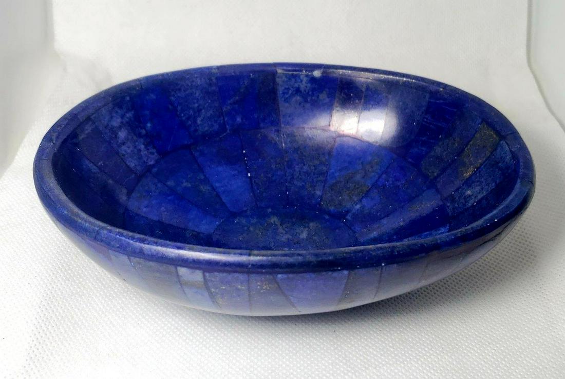 Royal Blue Lapis Lazuli Bowl - 401.6 Grams - 15X11X4.5: Title: Royal Blue Lapis Lazuli Bowl - 401.6 Grams - 15X11X4.5 CM Origin: Afghanistan Reserve: $120.00 Shipping: Domestic: Flat-rate of $65.00 to anywhere within the contiguous U.S. International: Fore