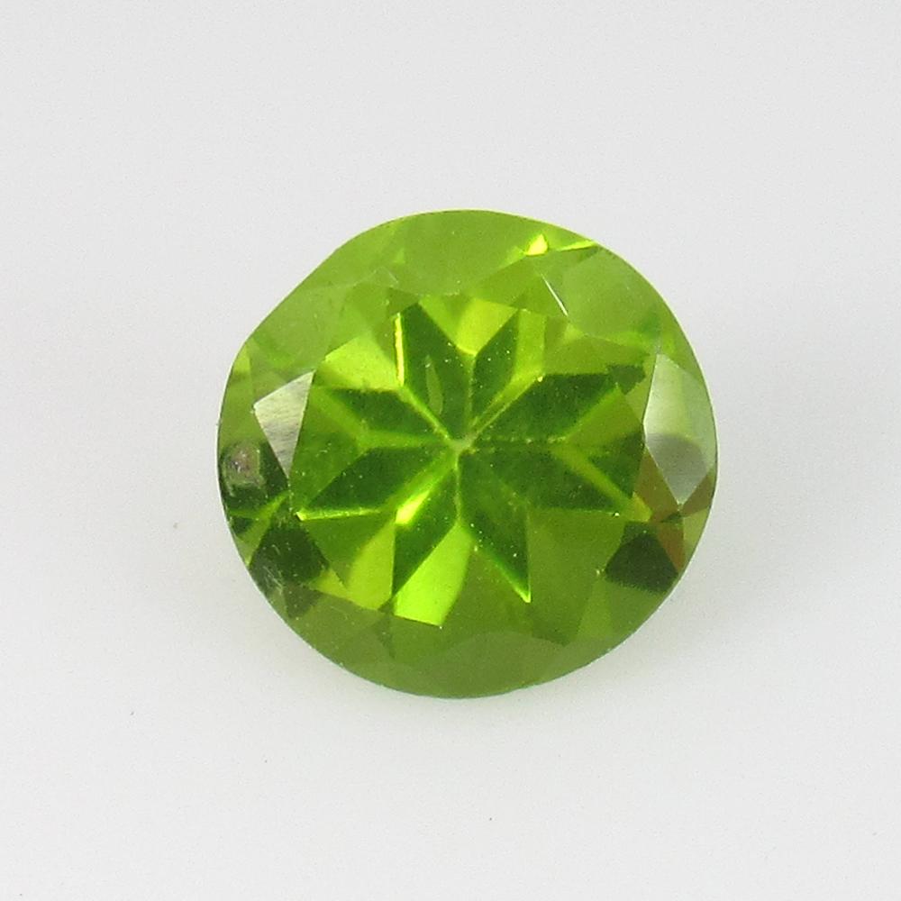 1.26 Ctw Natural Pakistan Peridot Round Cut: No Reserve! Title: 1.26 Ctw Natural Pakistan Peridot Round Cut Color/Clarity:VVS Gemstone: Peridot Carat Weight: 1.26 Size/Dimensions: 6.70 x 6.70 x 4.70 mm Additional Information:Top Class Luster / E