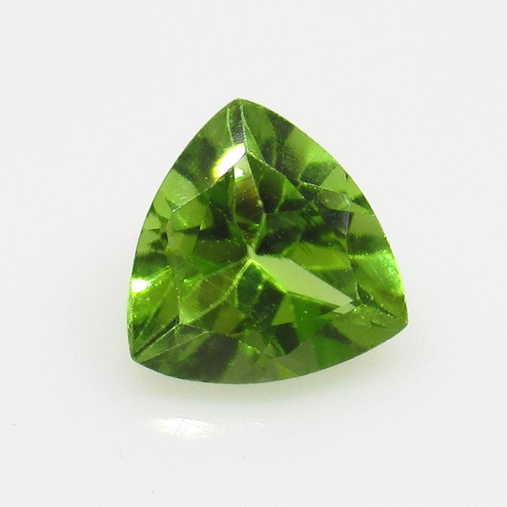 1.25 Ctw Natural Pakistan Peridot Trillion Cut: No Reserve! Title: 1.25 Ctw Natural Pakistan Peridot Trillion Cut Color/Clarity:VVS Gemstone: Peridot Carat Weight: 1.25 Size/Dimensions: 7.10 x 7.10 x 4.40 mm Additional Information:Top Class Luster 