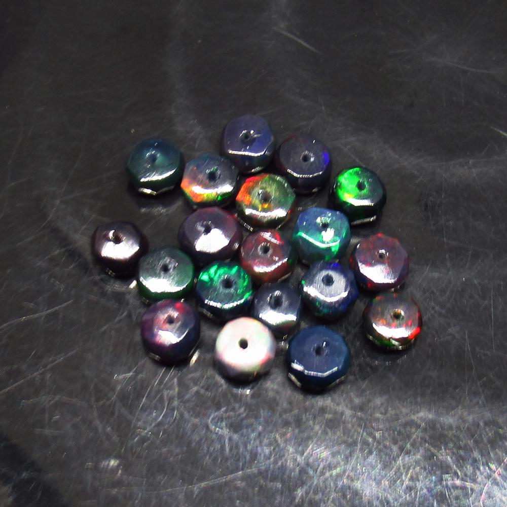 4.78 Ctw Natural 19 Drilled Faceted Black Opal Beads: No Reserve! Title: 4.78 Ctw Natural 19 Drilled Faceted Black Opal Beads Color/Clarity:Translucent Gemstone: Faceted Black Opal Beads Carat Weight: 4.78 Size/Dimensions: 3.90 to 4.60 mm / 19 PC's Addit