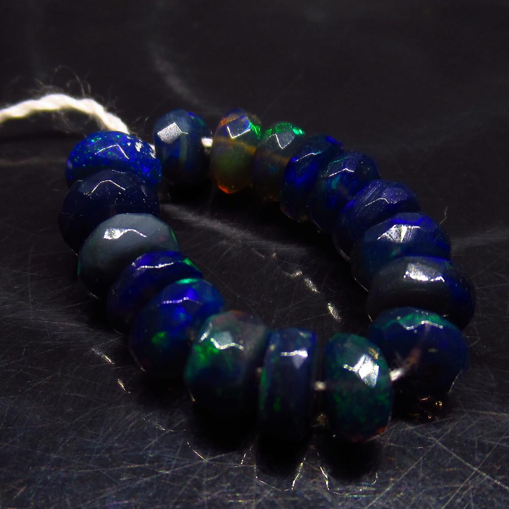 5.22 Ctw Natural 17 Drilled Faceted Black Opal Beads: No Reserve! Title: 5.22 Ctw Natural 17 Drilled Faceted Black Opal Beads Color/Clarity:Translucent Gemstone: Faceted Black Opal Beads Carat Weight: 5.22 Size/Dimensions: 4.50 to 4.90 mm / 17 PC's Addit