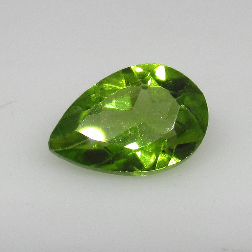 1.30 Ctw Natural Pakistan Peridot Pear Cut: No Reserve! Title: 1.30 Ctw Natural Pakistan Peridot Pear Cut Color/Clarity:VVS Gemstone: Peridot Carat Weight: 1.3 Size/Dimensions: 8.90 x 6.80 x 3.80 mm Additional Information:Top Class Luster / Exc