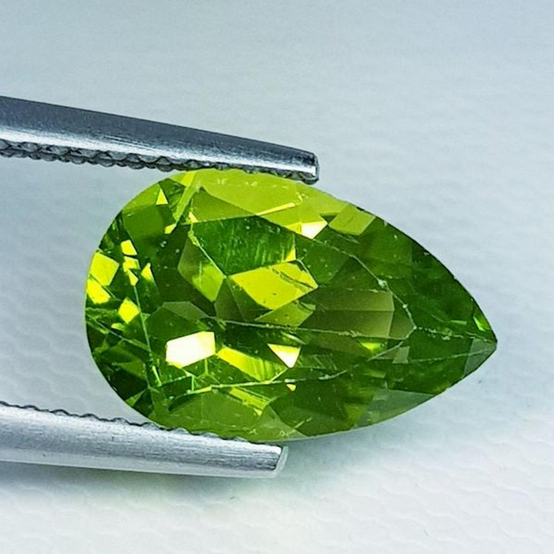 Natural Peridot Pear Cut 3.10 ct: No Reserve! Title: Natural Peridot Pear Cut 3.10 ct Color/Clarity: VVS Gemstones: Loosegemstone Carat Weights: 3.1 Size/Dimensions: 11.90 x 7.80 x 5.10 Additional Information: Pear - Pakistan Shipping