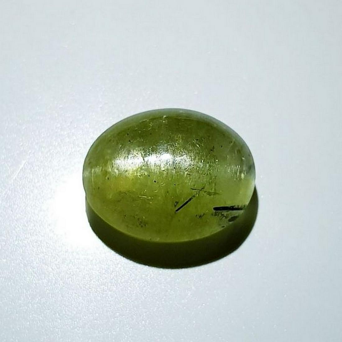 11.20 ct Natural Apatite cat's Eye: No Reserve! Title: 11.20 ct Natural Apatite cat's Eye Color/Clarity: Semi Transparent Gemstones: Loosegemstone Carat Weights: 11.2 Size/Dimensions: 14.60 x 11.70 x 7.80 Additional Information: Oval - 