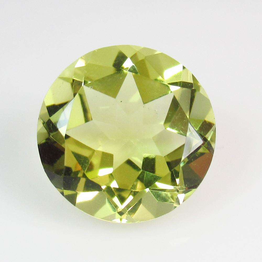7.56 Ct Natural Yellow Lemon Quartz 13 mm Round Cut: No Reserve! Title: 7.56 Ct Natural Yellow Lemon Quartz 13 mm Round Cut Color/Clarity: IF Gemstone: Natuarl Lemon Quartz Carat Weight: 7.56 Size/Dimensions: 13.00 x 13.00 x 8.20 mm Additional Informati