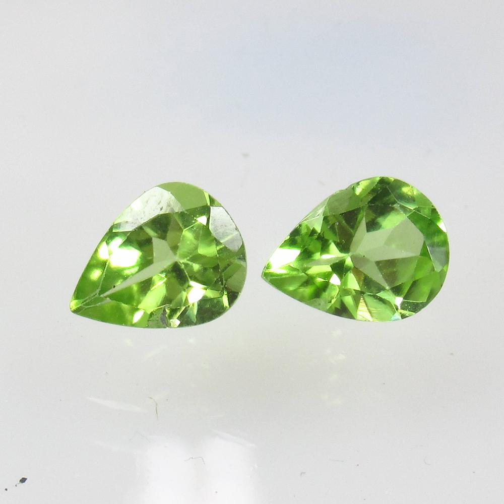 2.05 Ct Natural Pakistan Peridot Pear Pair: No Reserve! Title: 2.05 Ct Natural Pakistan Peridot Pear Pair Color/Clarity: VVS Gemstone: Natural Peridot Carat Weight: 2.05 Size/Dimensions: 7.90 x 6.10 x 3.90 mm / 2 PC's Additional Information: To