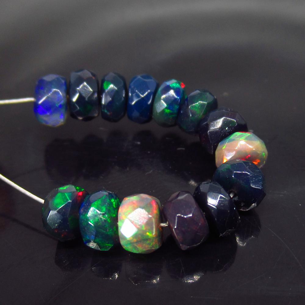 5.20 Ct Natural 14 Drilled Faceted Black Fire Opal: No Reserve! Title: 5.20 Ct Natural 14 Drilled Faceted Black Fire Opal Beads Color/Clarity: Translucent Gemstone: Natural Faceted Black Opal Beads Carat Weight: 5.20 Size/Dimensions: 4.60 to 5.10 mm / 