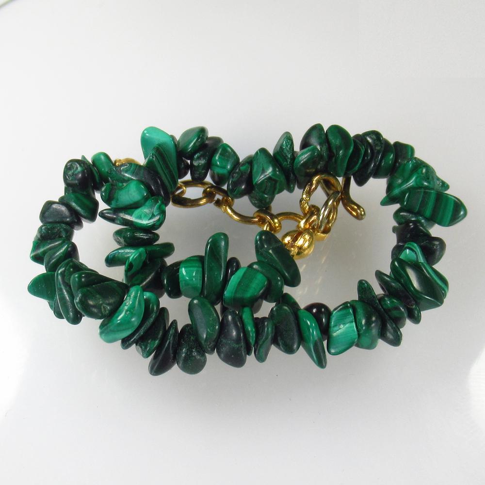 51.02 Ct Natural 72 Drilled Green Malachite Bracelet: No Reserve! Title: 51.02 Ct Natural 72 Drilled Green Malachite Bracelet Color/Clarity: Opaque Gemstone: Natural Malachite Bracelet Carat Weight: 51.02 Size/Dimensions: 5.6x4.0 - 8.8x1.1 mm / 72 PC's A