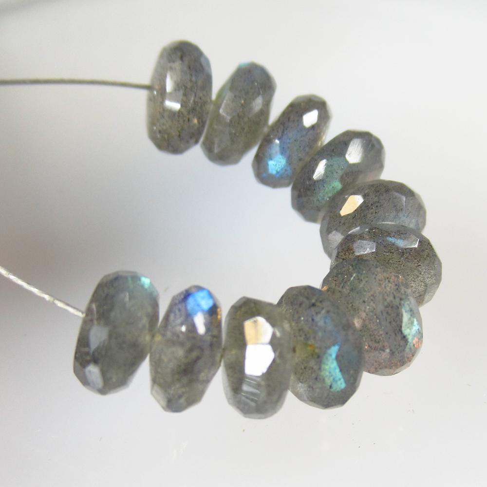 11.68 Ct Natural 11 Labradorite Drilled Round Beads: No Reserve! Title: 11.68 Ct Natural 11 Labradorite Drilled Round Beads Color/Clarity: Transparent Gemstone: Natural Labradorite Beads Carat Weight: 11.68 Size/Dimensions: 6.40 to 6.70 mm / 11 PC's Add