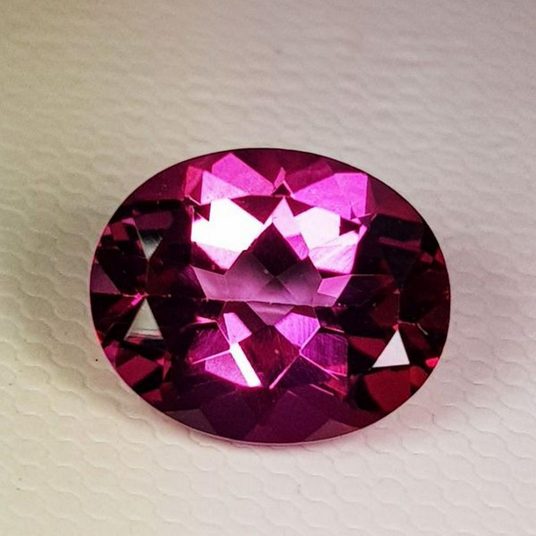 4.08 ct Natural Pink Topaz Oval Cut: No Reserve! Title: 4.08 ct Natural Pink Topaz Oval Cut Color/Clarity: VVS Gemstones: Loosegemstone Carat Weights: 4.08 Size/Dimensions: 10.00 x 9.00 x 5.40 Additional Information: Oval - Brazil Shippi