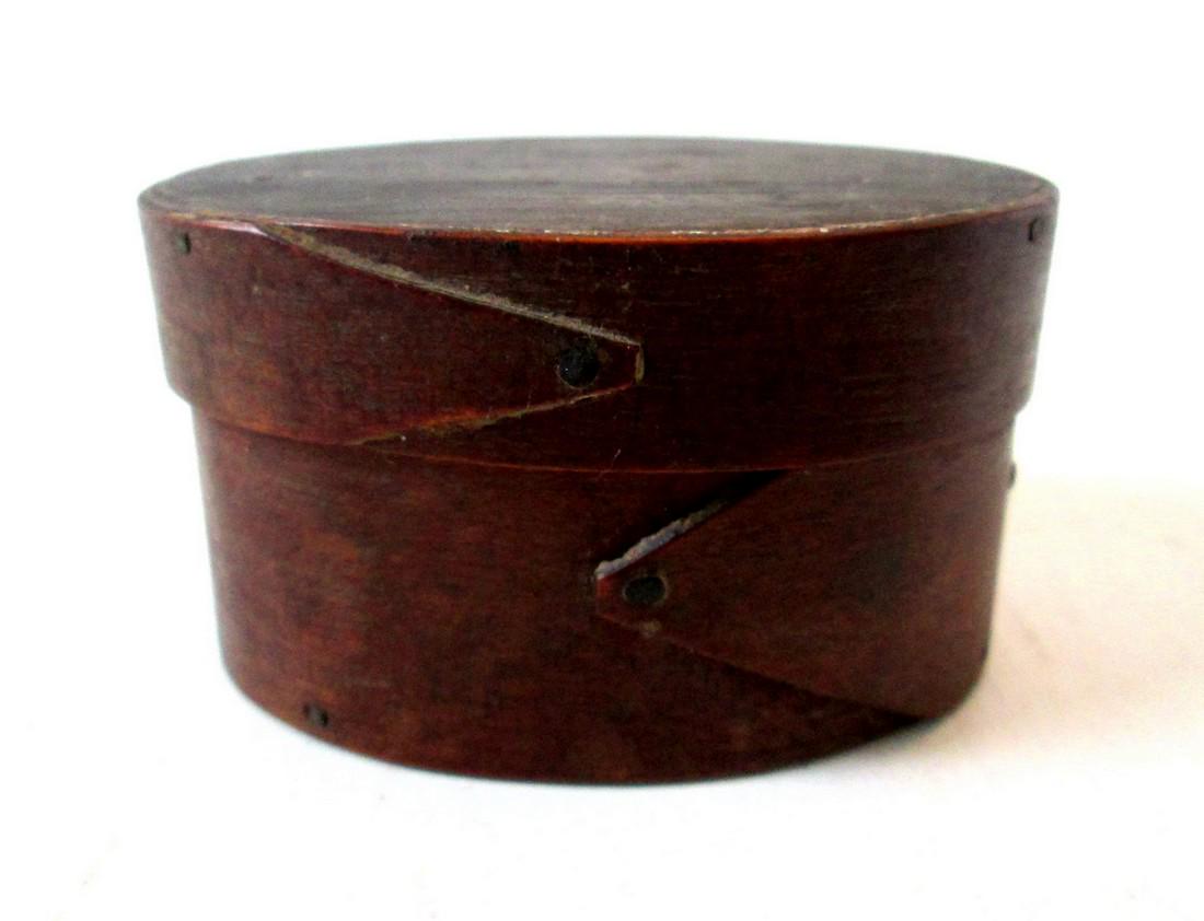 Small Oval Hingham Pantry Box: Title: Small Oval Hingham Pantry Box Date: Mid 19th C Material: Maple & Pine Dimension: 1 3/4”H X 3”W X 2 3/16”D Provenance/Additional Info: Fantastic rare tiny oval Hingham, MA two finger pantr