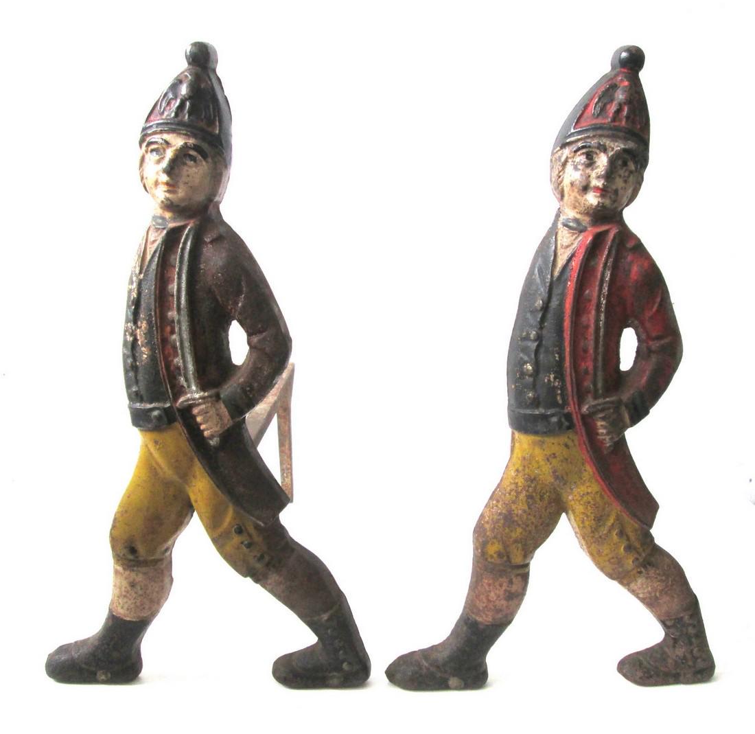 Colorful Hessian Soldier Andirons: Title: Colorful Hessian Soldier Andirons Date: C 1900 Material: Cast Iron Dimension: 19 1/4”H X 10 1/2”W X 19”D Provenance/Additional Info: Well detailed ½ round hollow cast figures, retaining 