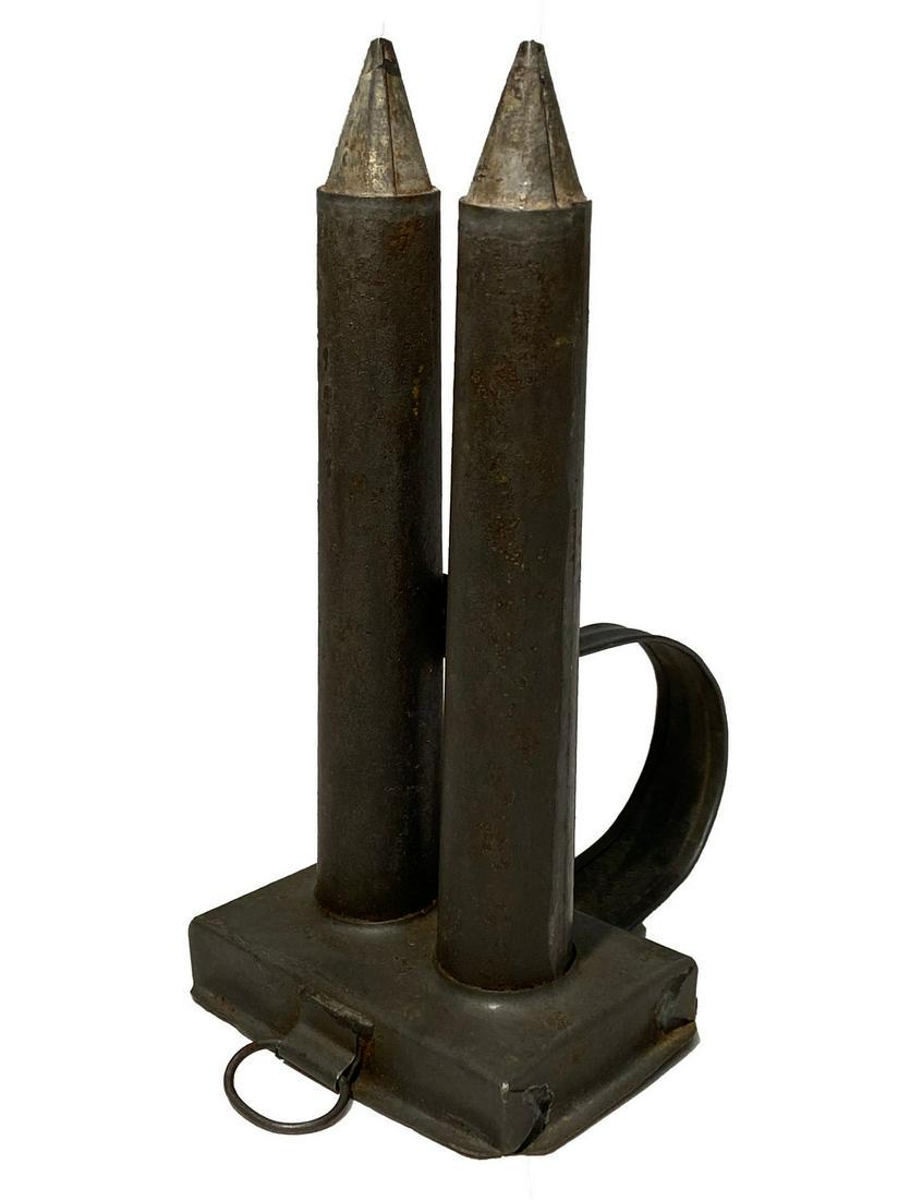 Mini Candle Mold: Title: Mini Candle Mold Dimensions: 6” tall ¾” tube diam. Provenance/Additional Info: A two tube, raw tin mini candle mold. With original handle and ring hanger. Pennsylvania origin. Ca. 1830. Sh