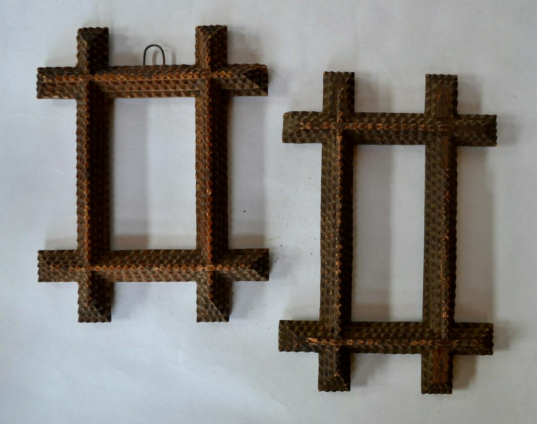 Near Pair of Small Tramp Art Frames; Near Pair of Small: Near pair of two small, similar tramp art frames. Both are in a beautiful old patina. Both have four layers of chip carving. The shorter, lighter colored frame is in excellent condition. The taller, d